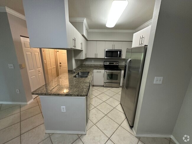 Building Photo - 6530 Emerald Dunes Dr Unit 308 Rental