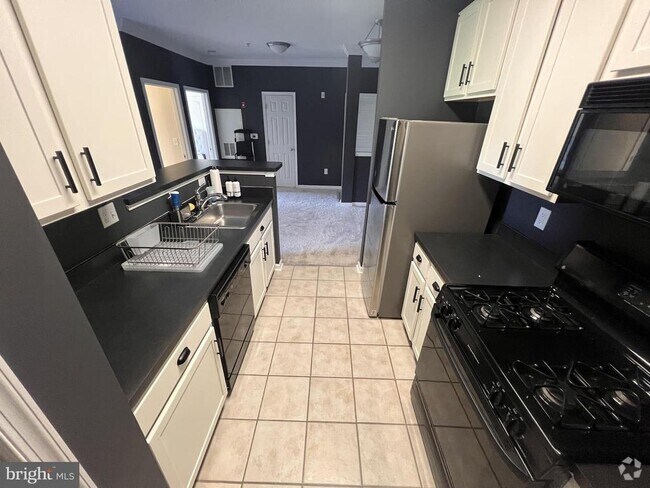 Building Photo - 4870 Eisenhower Ave Unit 308 Rental