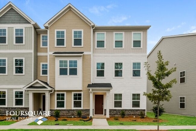 Building Photo - Modern 3-Story Townhome with First-Level B...