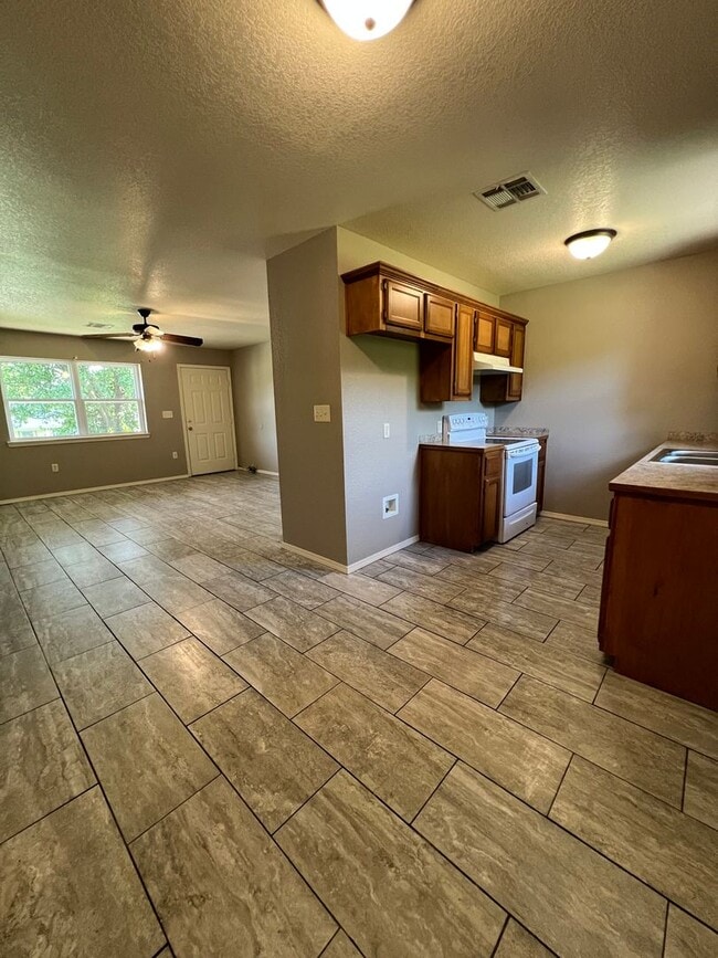 Photo - 3 Bed 1.5 Bath House, 1 Car Carport, Yard Care Included.