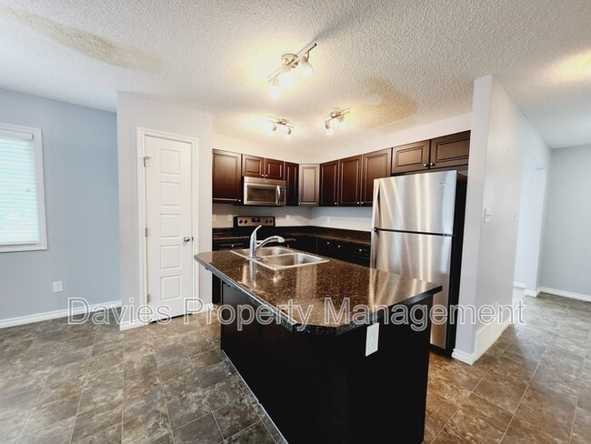 Photo - 21912-21990 90 Ave NW