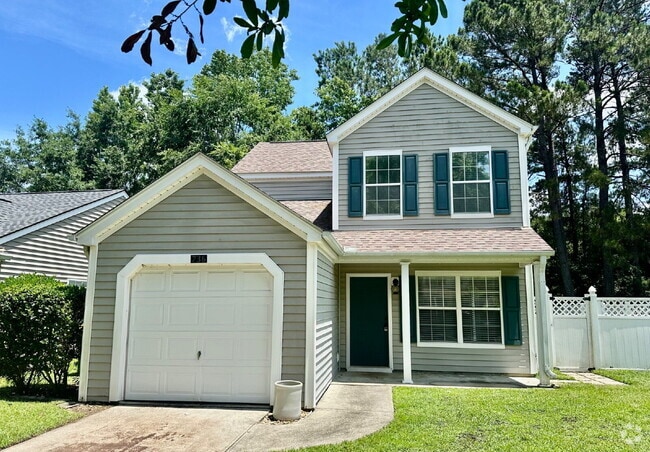 Building Photo - Four Bedroom Home with Private Fenced Back...