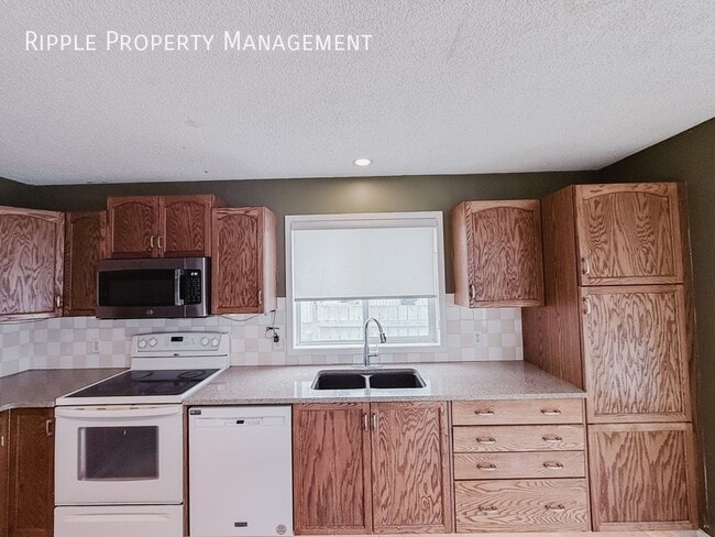 Photo - AMAZING 3 BEDS, 2.5 BATHS UPPER UNIT | Double Detached Garage & Private Backyard