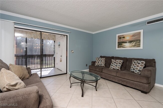 Building Photo - 6110 Whiskey Creek Dr Unit 212