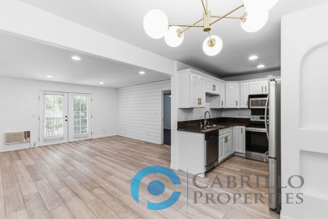 Building Photo - *** $500 OFF MOVE IN SPECIAL!!! *** Beautifully Renovated 2BD/2BA Condo with In-Unit Washer and D... Unit 208