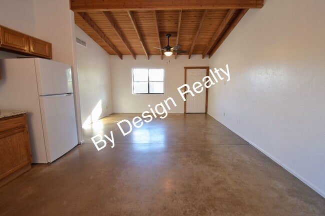 Photo - Charming Mid-Century Style: Vaulted Beams & Private Oversized Yard