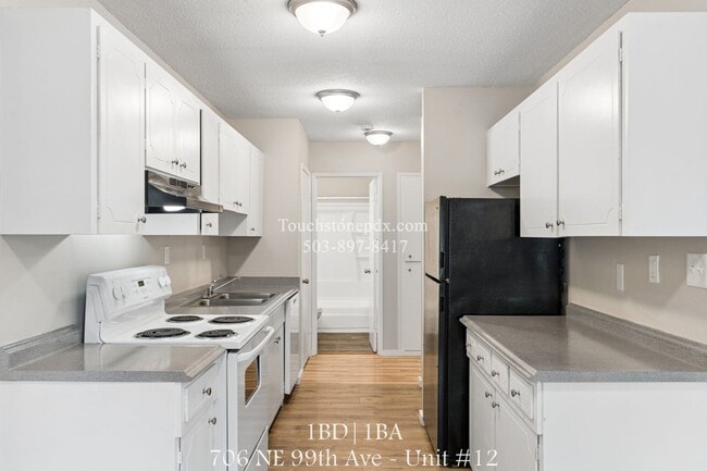Building Photo - 706 NE 99th Ave Unit #12
