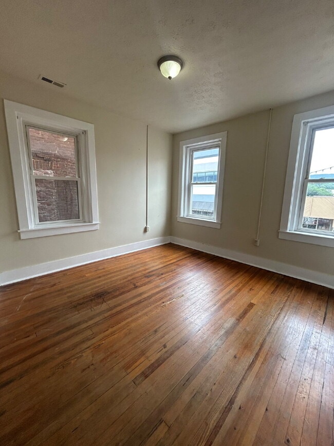 Building Photo - July Only- Submit your application this month and pay a reduced application fee of just $32. 1 B...