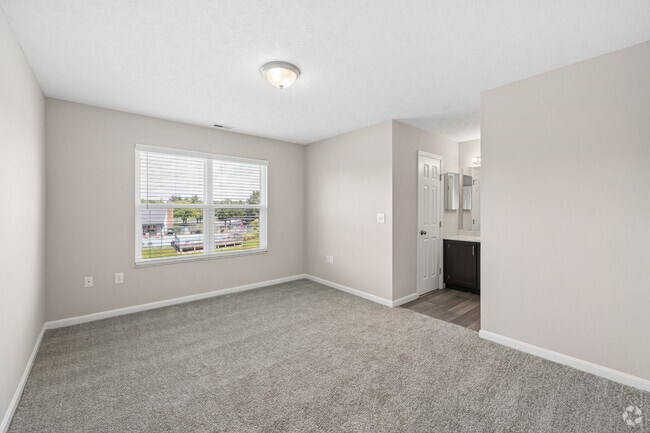 3BR, 2BA - 1,232SF - Primary Bedroom