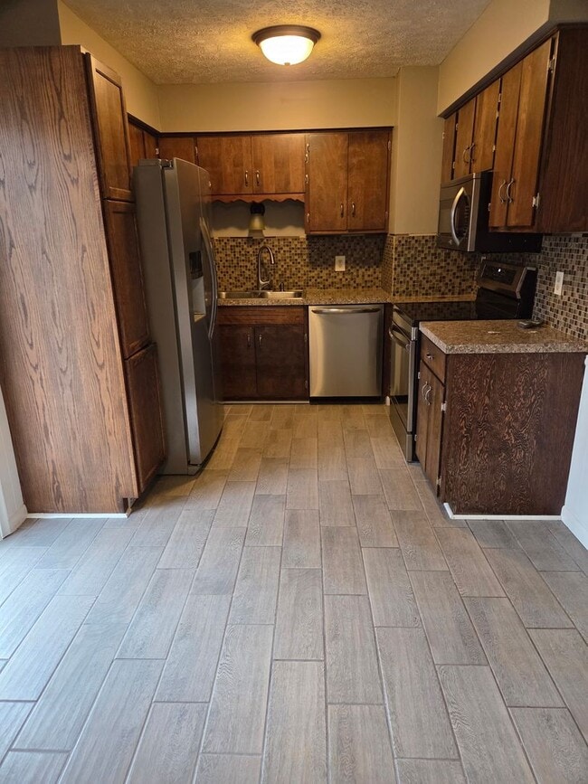 Photo - 3 bed 1.5 bath, 2 car garage, fenced in backyard, newly remodeled