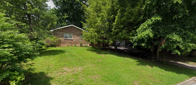 Photo - Spacious & Pet-Friendly 4BR Home in Prime ...