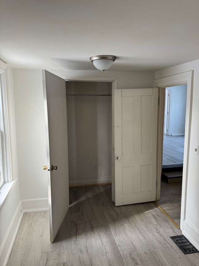 Photo - 2 bedroom 1 bath single family home. Freshly painted with new flooring .