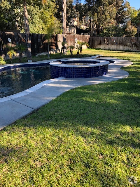 Sallt water pool/grass area - 7837 Quince St Rental