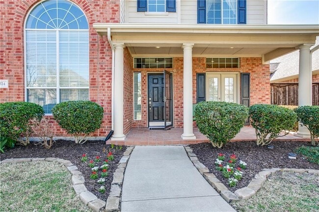 Photo - Immaculate home on a beautifully landscaped lot, tandem garage, plenty of storage!