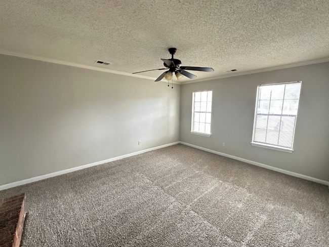 Photo - MOVE-IN READY! 3BR/2BA in Quiet Cove | Brick Fireplace | Fenced Yard & Patio!