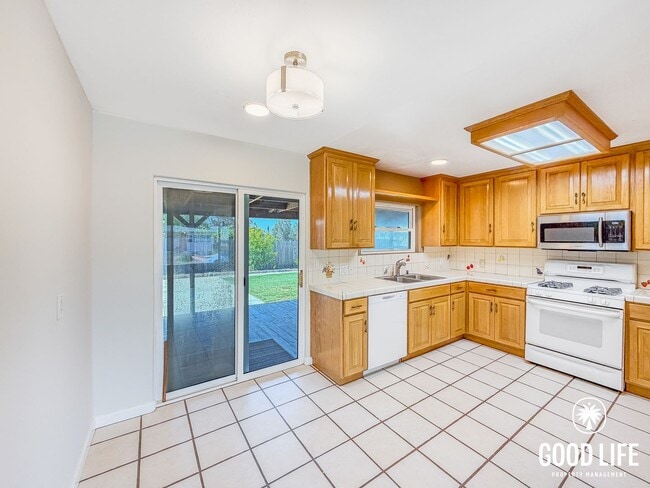 Photo - SD: 2BD/1BA Home in La Mesa with Turf Yards, Large Backyard, W/D & 2-Car Garage