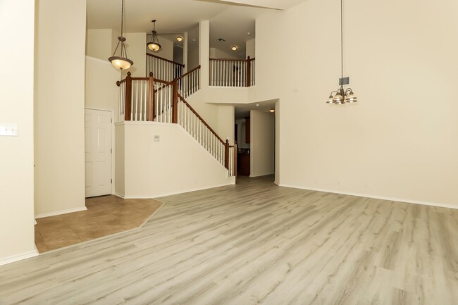 Photo - Spacious & Sun-Filled 4BR Retreat with Open-Concept Living and Versatile Dual Living Areas