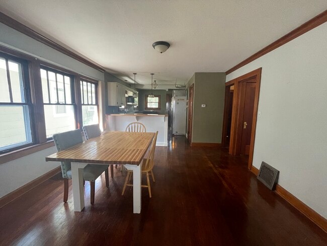 Dining room/Open concept kitchen. First bedroom door located on right - 4528 Terrace St