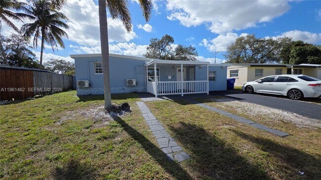 Building Photo - 6616 Raleigh St Unit 1