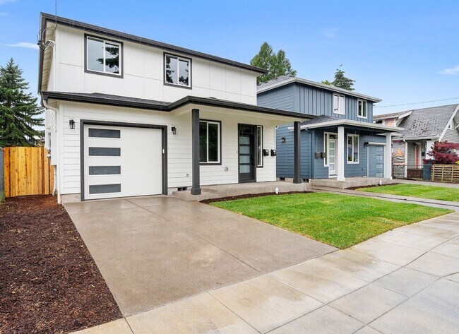 Photo - Brand-New 4-Bedroom Home Offering Modern Design, High-End Finishes, Attached Garage & Private Bac... Unit #A