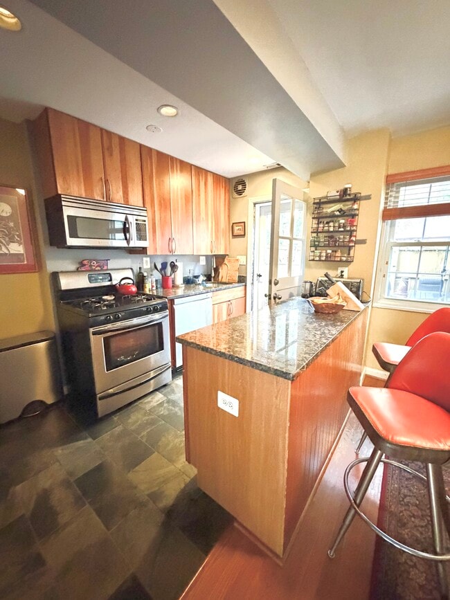 Stainless steel, marble-top - 1723 N Cliff St