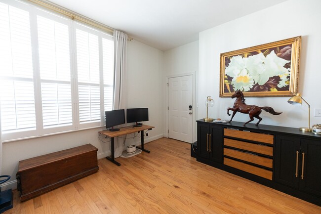 Photo - Spacious 2BR Apartment in the Heart of Downtown with Private Garage Parking