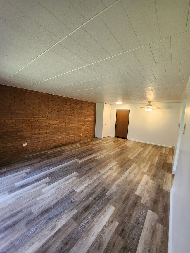 Living Area with Flooring - Pebble Creek