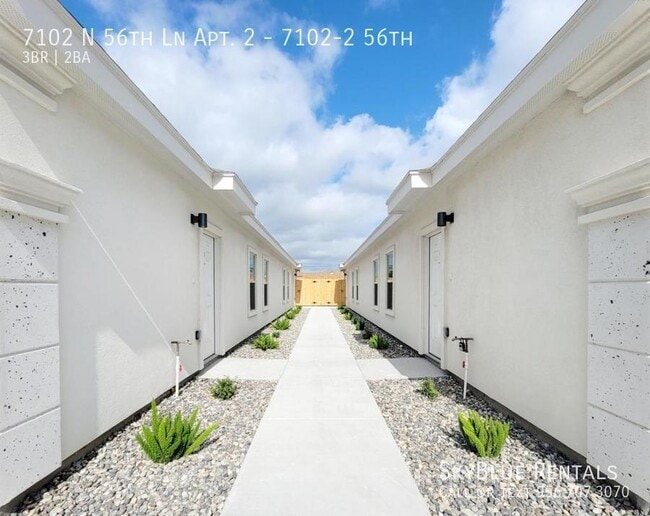 Building Photo - 7102 N 56th Ln Unit 7102-2 56th