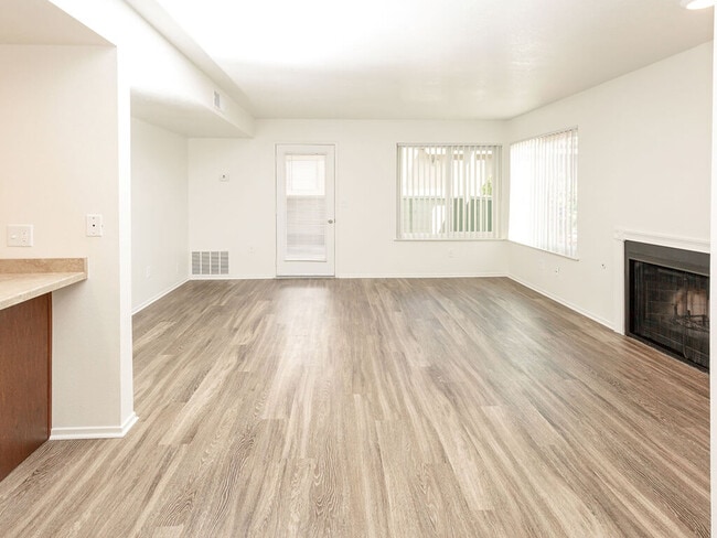 Spacious Apartments with Woodgrain Flooring & Fireplace