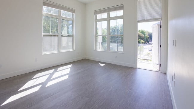 Living Room with Balcony and Hard Surface Flooring