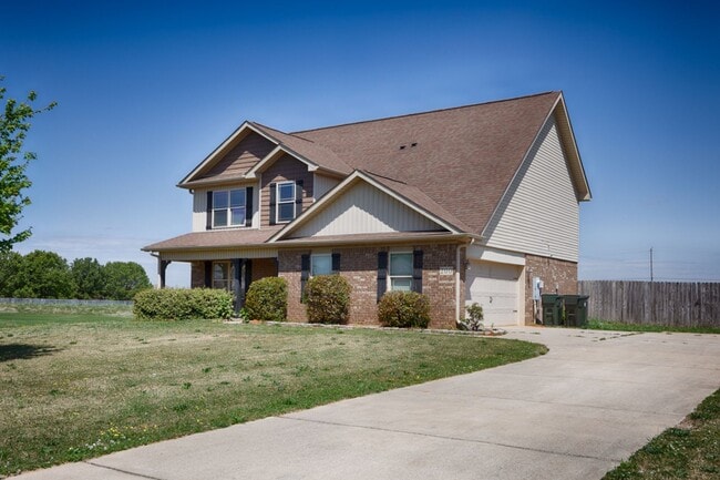 Photo - Fresh Paint & New Carpet! 4BR with Fenced Yard