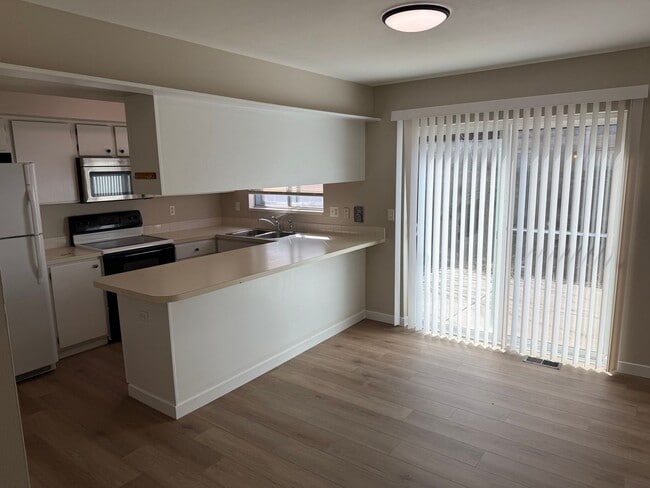 Photo - Spacious 2-bed, 1.5-bath Townhouse-Delivers Comfort & Convenience