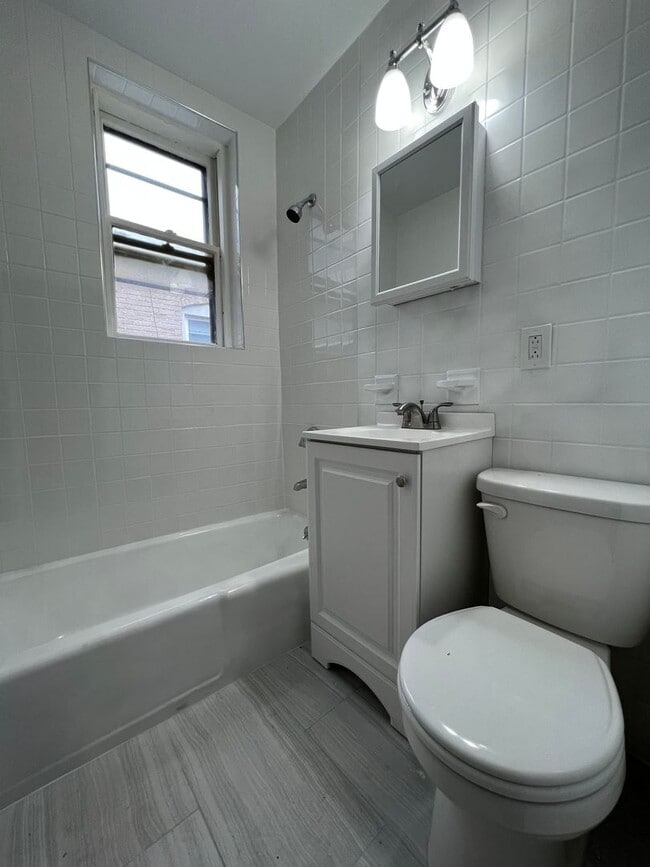 Photo - 8/1 Spacious top floor 3BR in Lower Allston, w/d in unit!