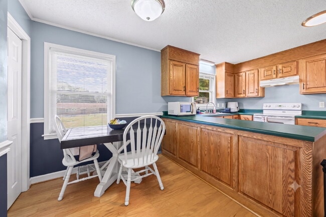 Photo - Charming All-Brick 3BR Home with Carport & Easy Charlotte Commute!