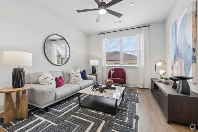 2BR, 2BA - 1,172SF - Living Room - Domain Huntsville