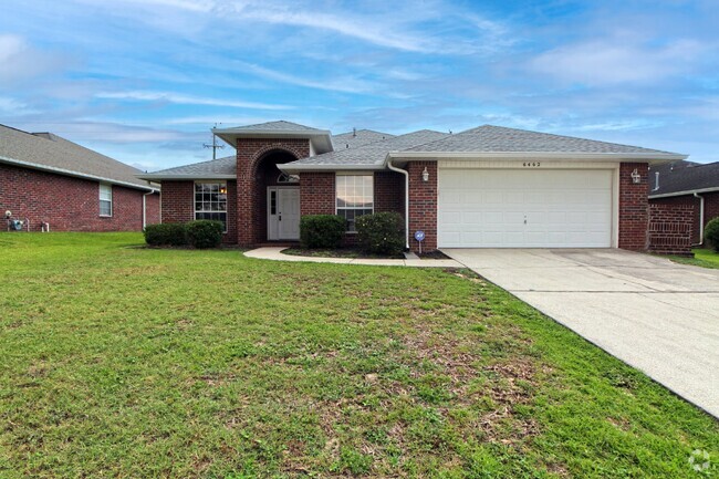 Building Photo - Executive 3-Bedroom Brick Home with Florid...