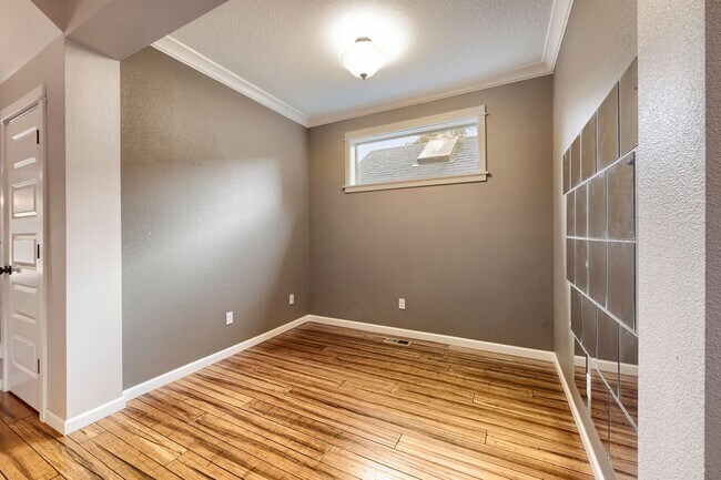 Photo - Custom-Built 4BR/2.5BA Two-Story Near Woodstock — Quartz Island Kitchen, Gas Fireplace & Fenced Y...