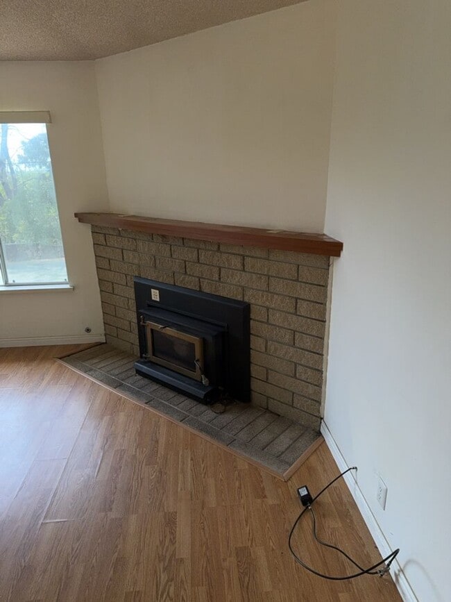 Photo - Charming 3-bedroom, 2-bathroom home is nes...