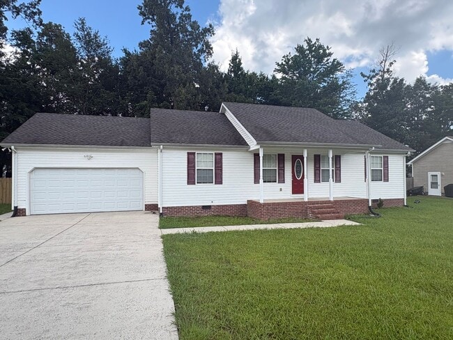 Building Photo - Charming Home with Covered Back Deck and Fenced in Yard...