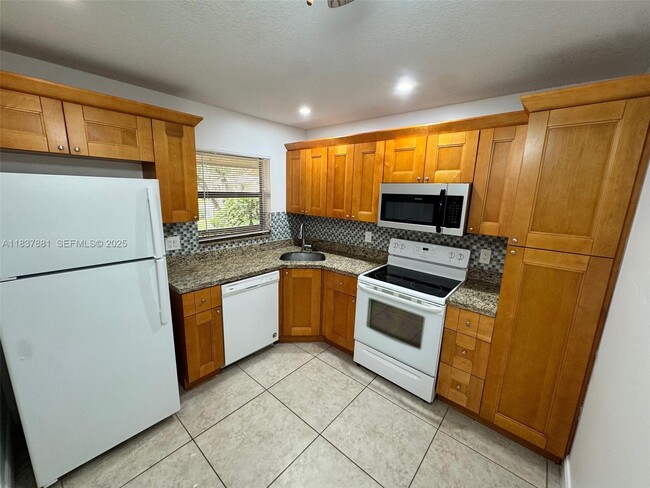 Photo - 3817 Cocoplum Cir Unit 3585