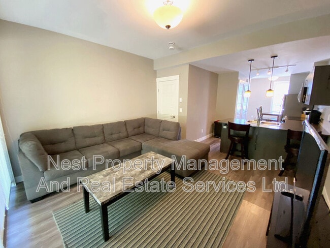 Photo - 110-110 Baxter Ave