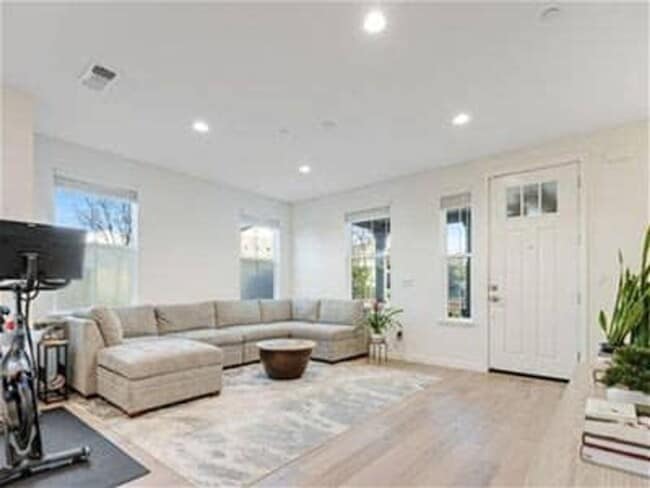 Photo - Beautiful, light filled home with EV charger, cozy backyard, very convenient SWSR location