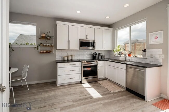 Photo - Charming Three Bedroom Home with Large Fenced Yard