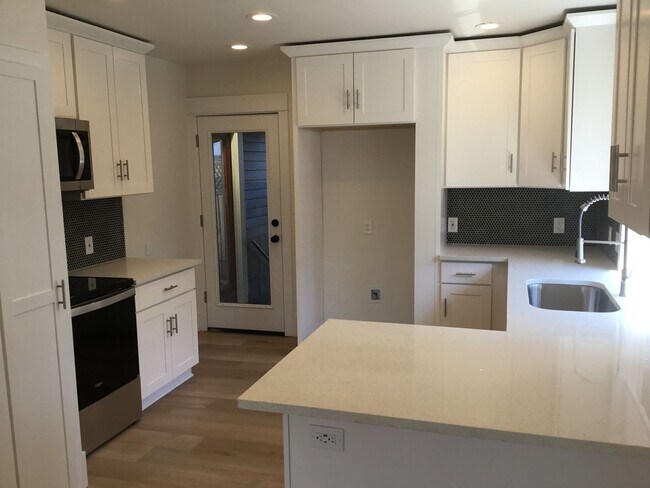 Photo - GOURMET KITCHEN/OPEN FLOOR PLAN