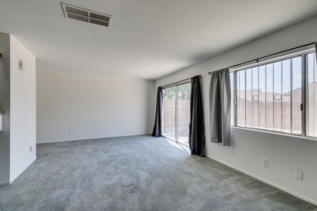 Photo - Double Primary Townhome with Spacious Backyard in 89115!