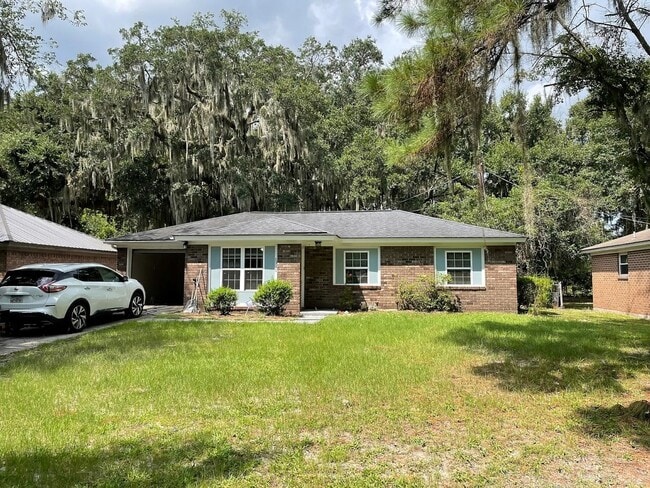 Building Photo - Charming 3BR Brick Home near Sandfly with Fully Fenced Backyard