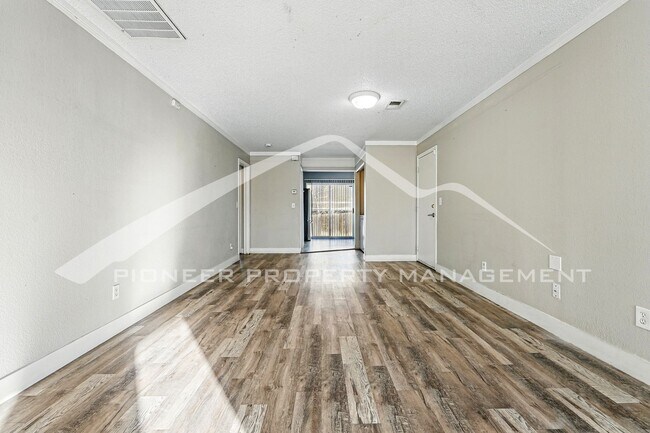 Photo - Spacious 3-Bedroom Home with Modern Features and Private Yard