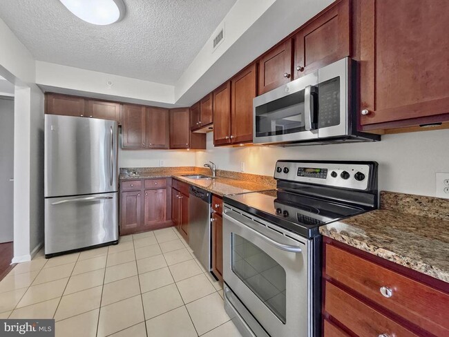 Building Photo - 2230 George C Marshall Dr Unit 829