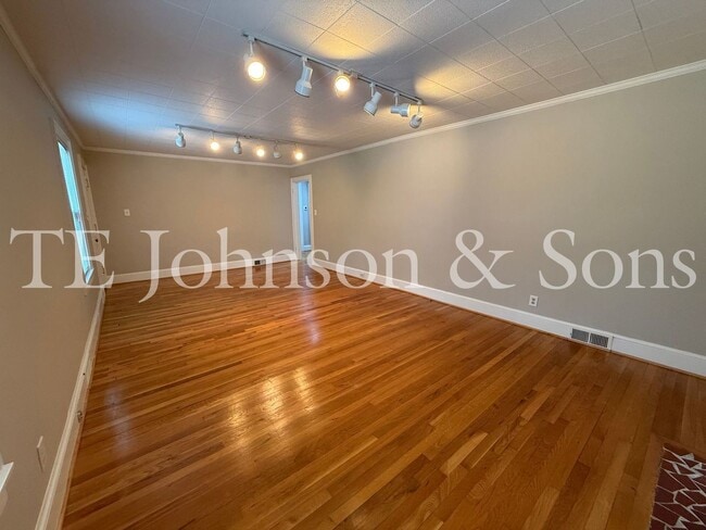 Photo - Spacious 3 Bedroom Home with Primary Suite on Main Level and 2-Car Carport