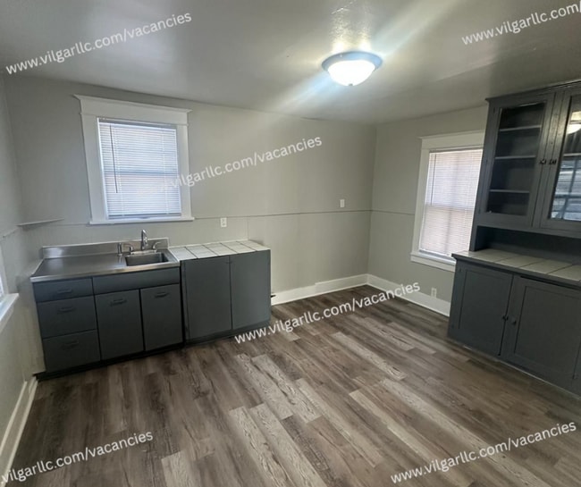 Photo - Step into comfort, convenience, and quality living in this conveniently designed 4-bedroom, 2-flo...